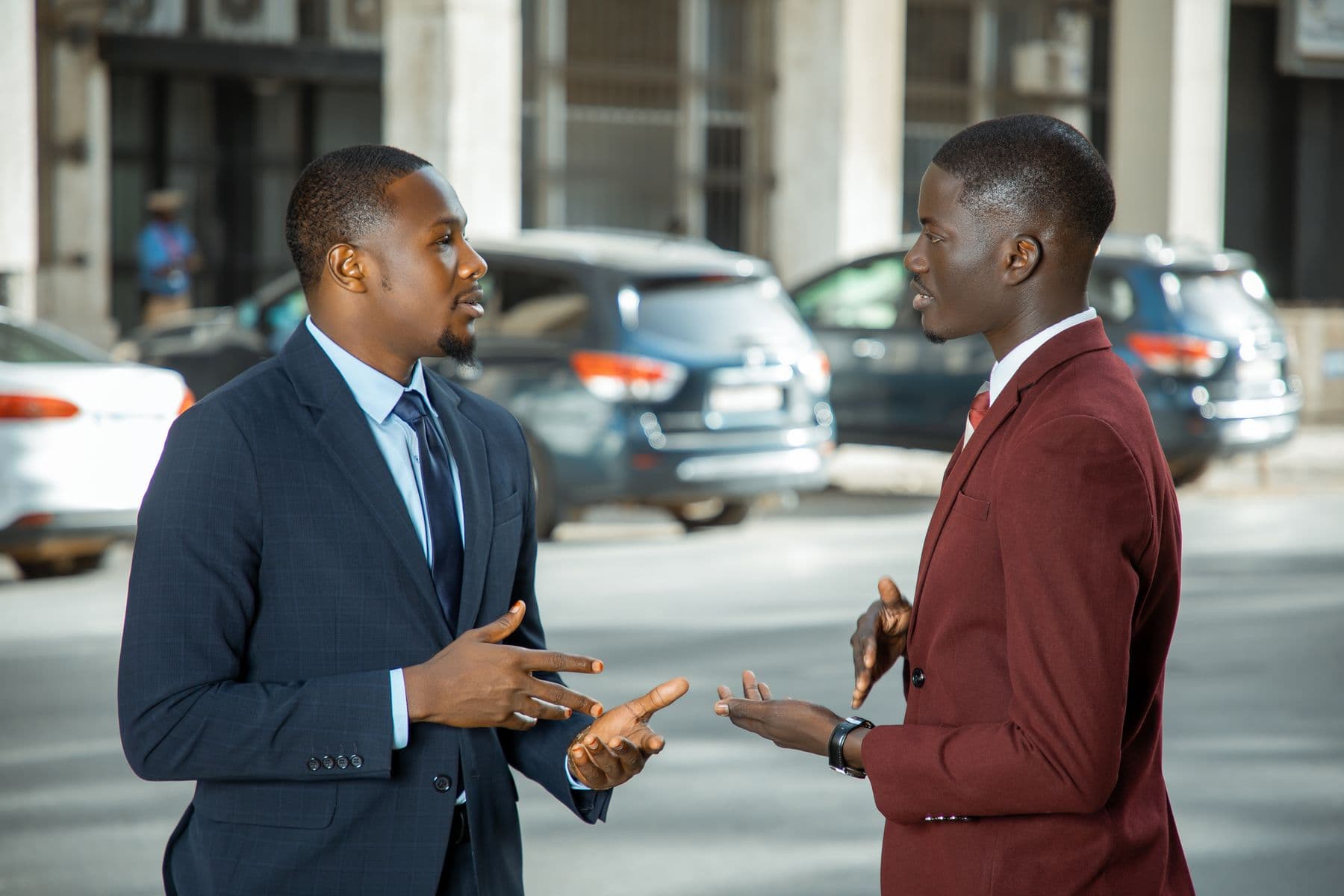 A one-to-one conversation across a table, natural light